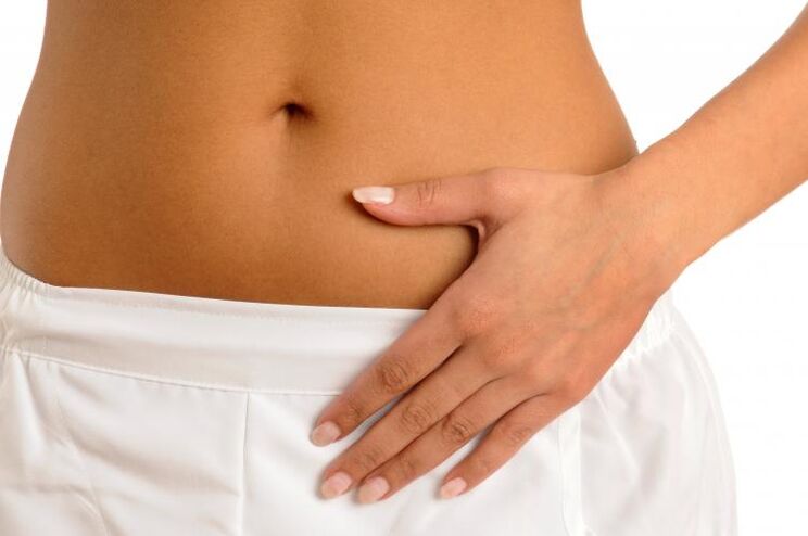 pain in the lower abdomen as a symptom of cystitis in women